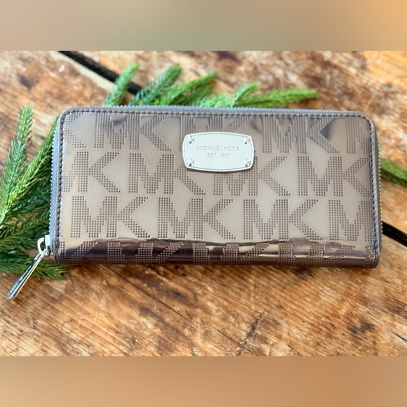 Michael Kors Handbags - Michael Kors Silver Logo Wallet